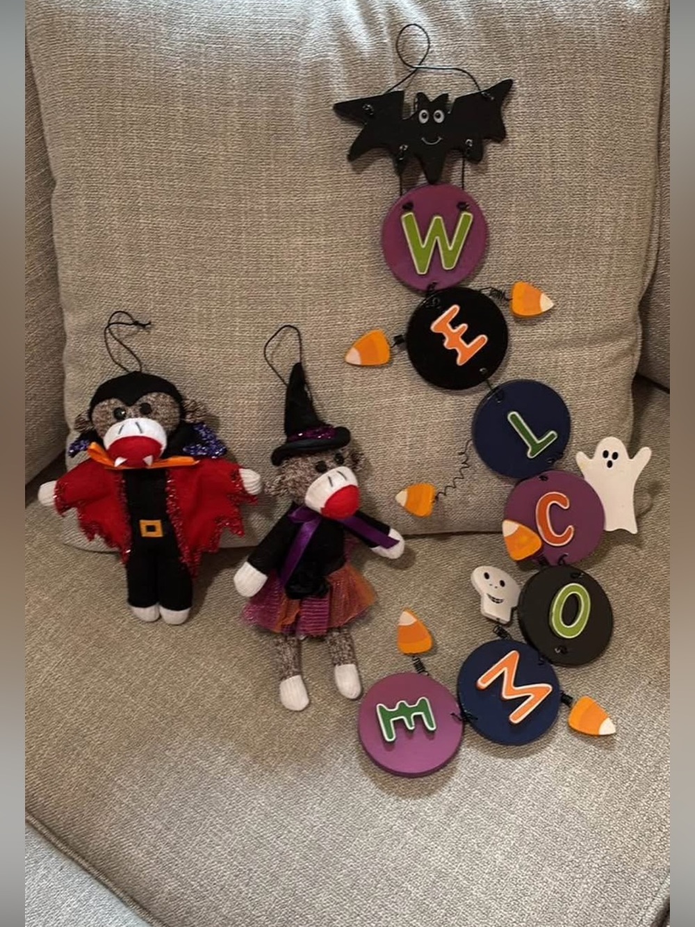 3 piece Halloween bundle. Door hanger & 2 sock monkey plushies w hanger